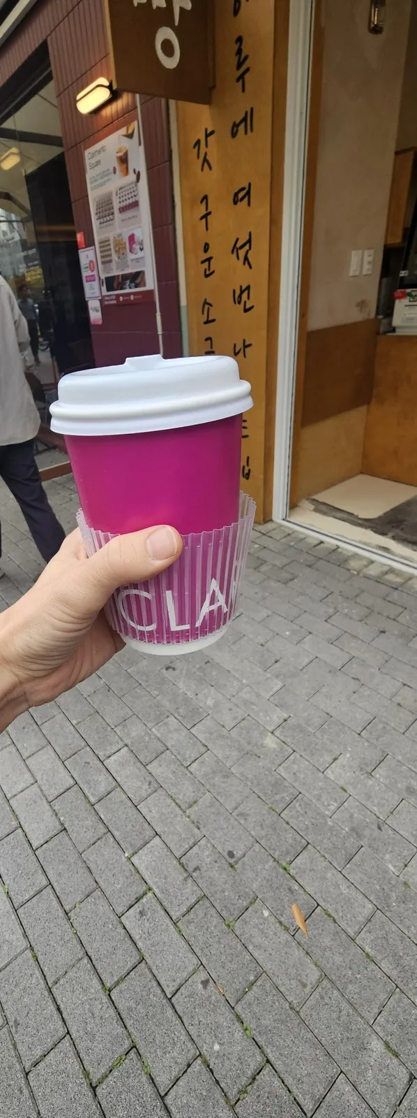 Clarimento's pink takeout cup