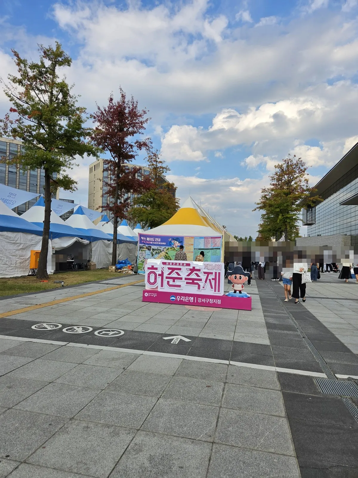 The "Medical Health Culture, 24th Heo Jun Festival" photo zone and the booth layout map sign
