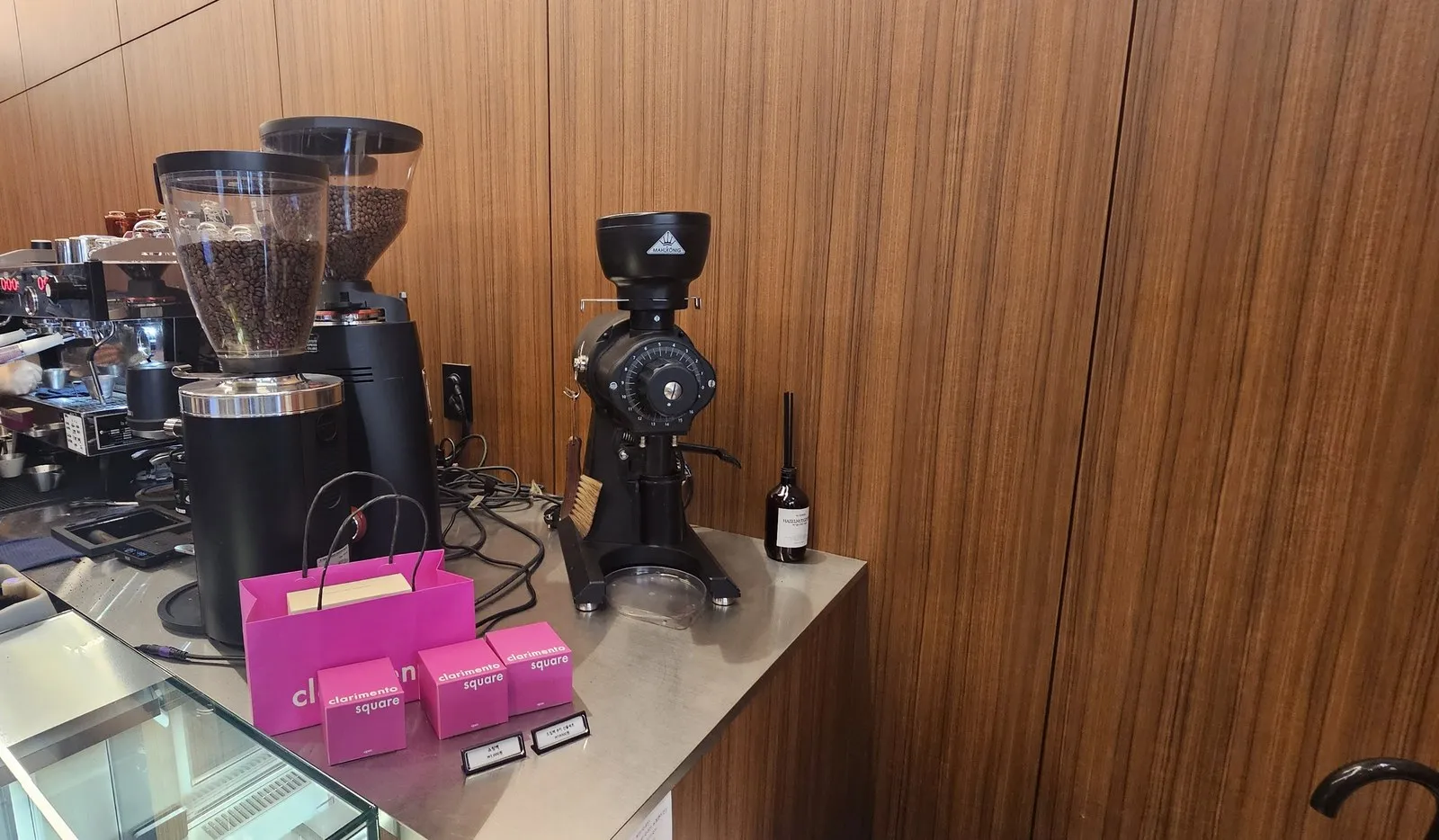 The bar with the espresso machine and grinder